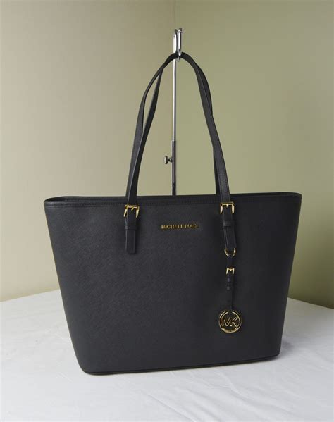 michael kors jet set travel laukku|jet set travel large signature logo pocket tote bag .